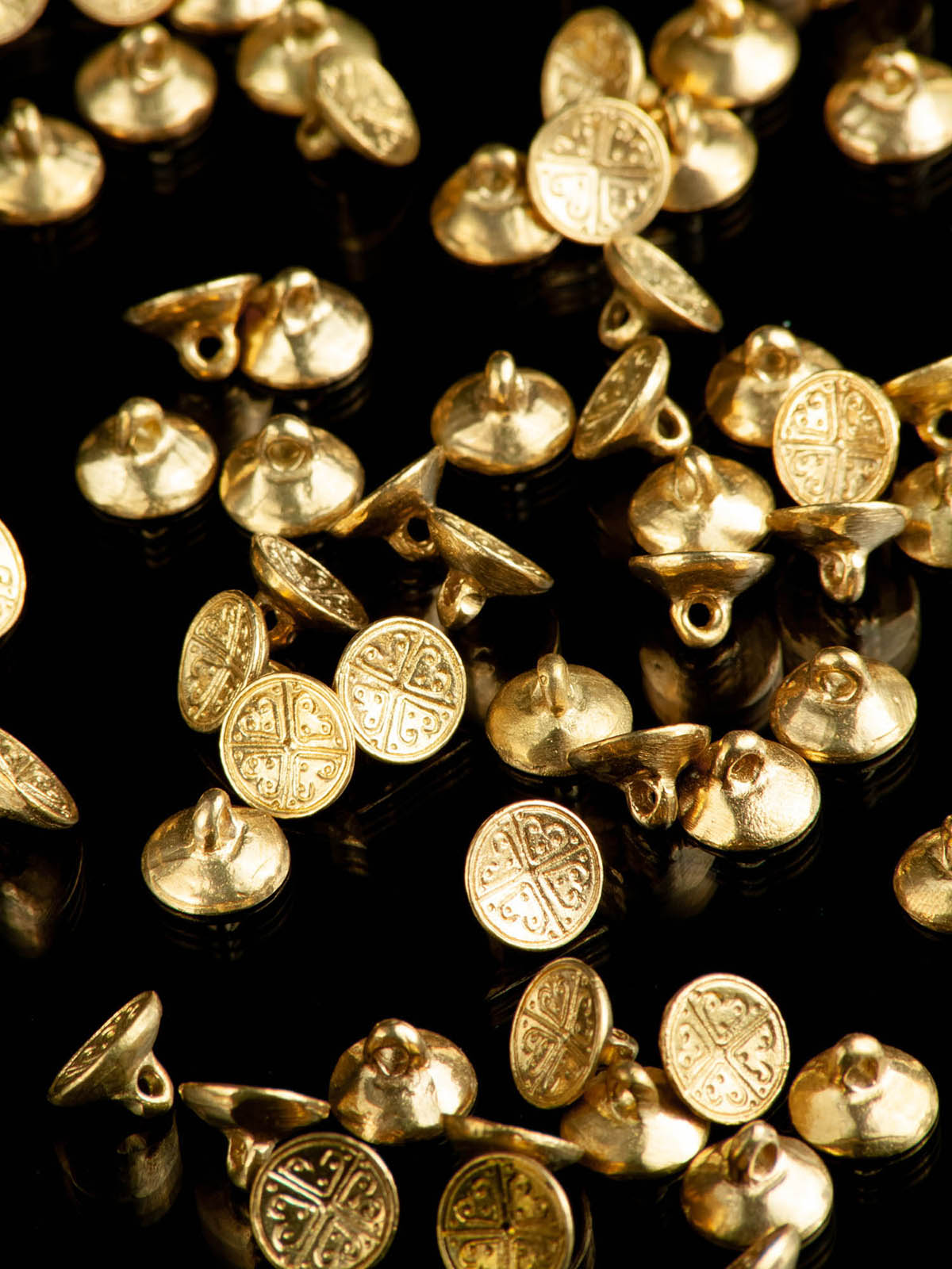 Medieval brass buttons, the 11th-15th centuries for the