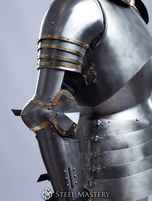 Knightly plate arms of the 14th century with Elbow Caps Metal bracers, couters and full arms