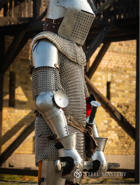 German knightly plate arms of the 14th century with Elbow Caps Metal bracers, couters and full arms