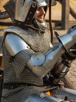 German knightly plate arms of the 14th century with Elbow Caps Metal bracers, couters and full arms