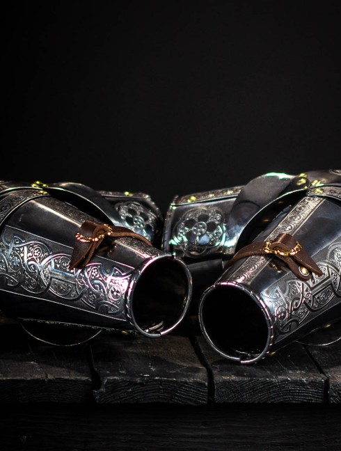 Knightly arms plate 16th century  Metal bracers, couters and full arms