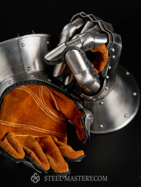 Gauntlets dated 1410-1420  Metal fingered and mitten gauntlets