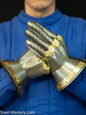Gauntlets dated 1410-1420  Metal fingered and mitten gauntlets