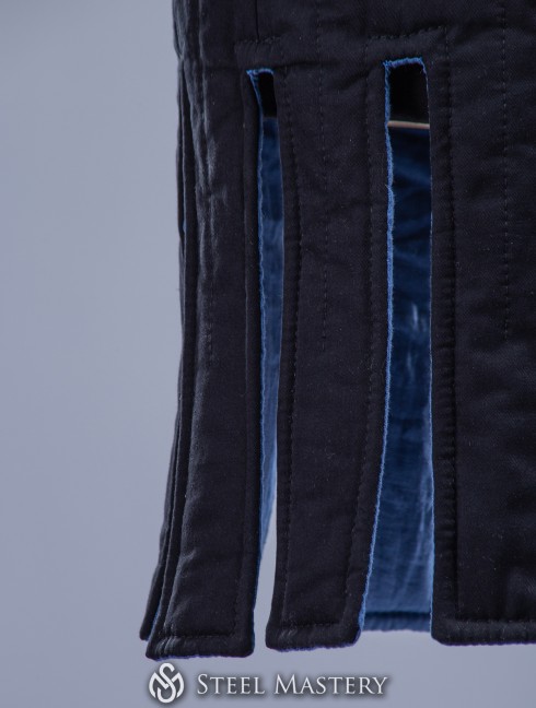 Gambeson with festoons XII-XIII centuries. Gambesón.