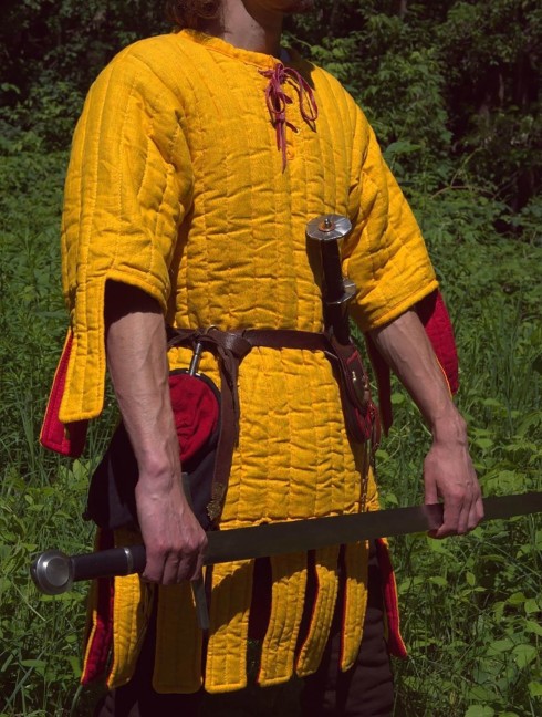 Gambeson with festoons XII-XIII centuries. Gambeson
