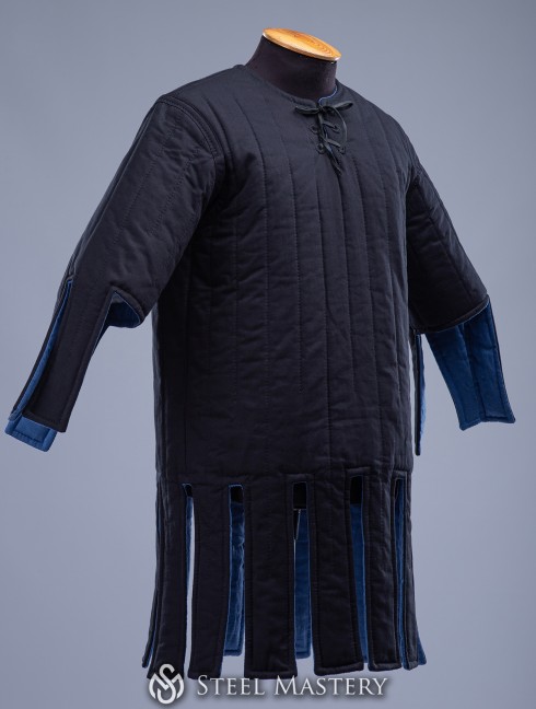 Gambeson with festoons XII-XIII centuries. Gambesón.
