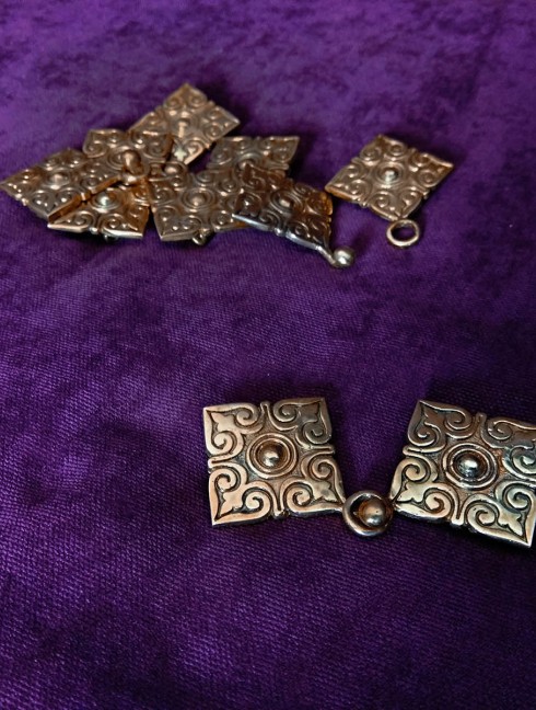 Decorative caftan fastener, X century Brooches and fasteners