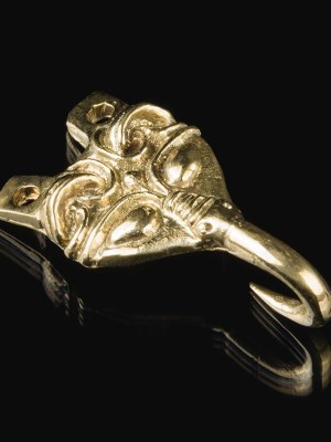 Medieval Bear shaped hook for leg wrappings, X century Brooches and fasteners