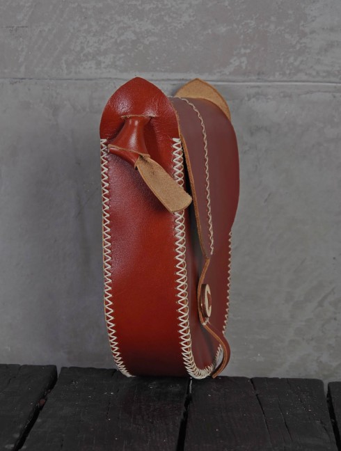 Leather bag with hand-made stitching