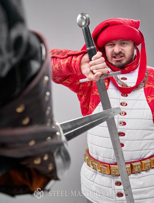 Gambeson of XIV- XV century with contrast sleeves and buttoned collar Gambison