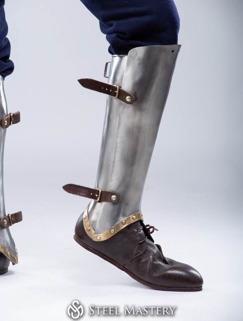 Titanium greaves with brass decoration Ready padded armour