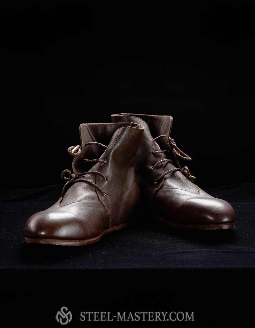 High boots with front lacing, 14th century photo made by Steel-mastery.com