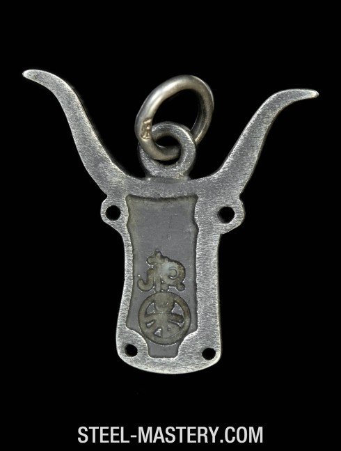 Female figure on the bull's head