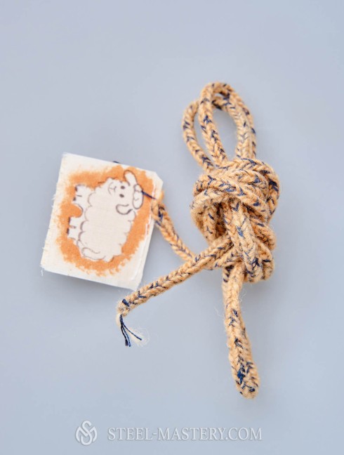 Sand with blue wood lacing cord