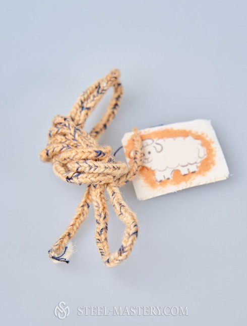 Sand with blue wood lacing cord