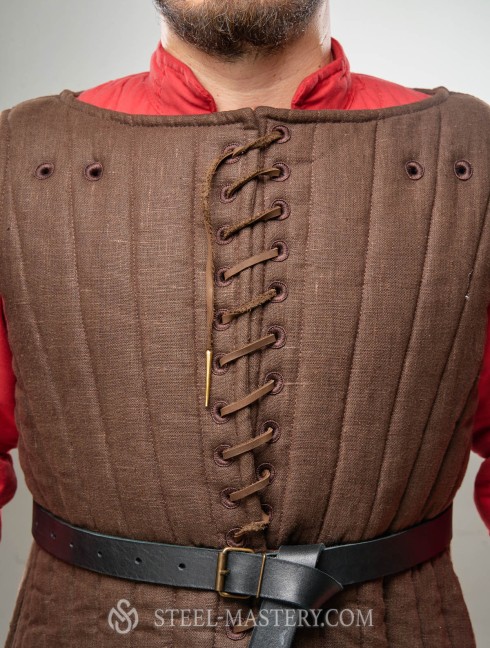 Sleeveless gambeson with festoons, XII-XIII centuries