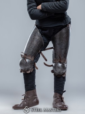 Thigh and knee protection hardened steel with blackened hammered finish 