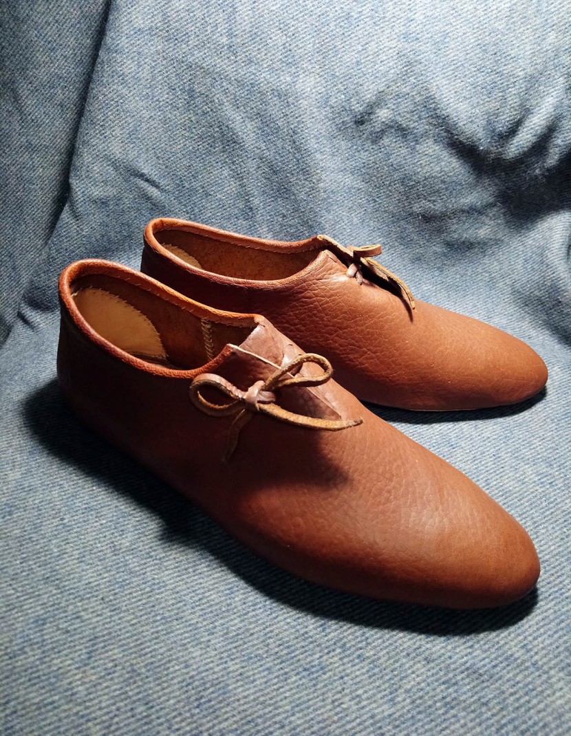 Medieval shoes from Bocksten, in stock  photo made by Steel-mastery.com