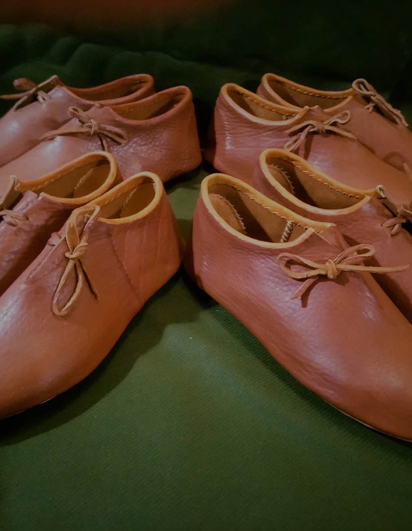 Medieval shoes from Bocksten, in stock  photo made by Steel-mastery.com