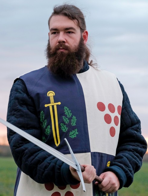 Tabard with silk-screening of scarlet dots, golden swords, and