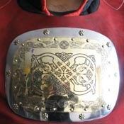 Decoration: brass breast plate with etching