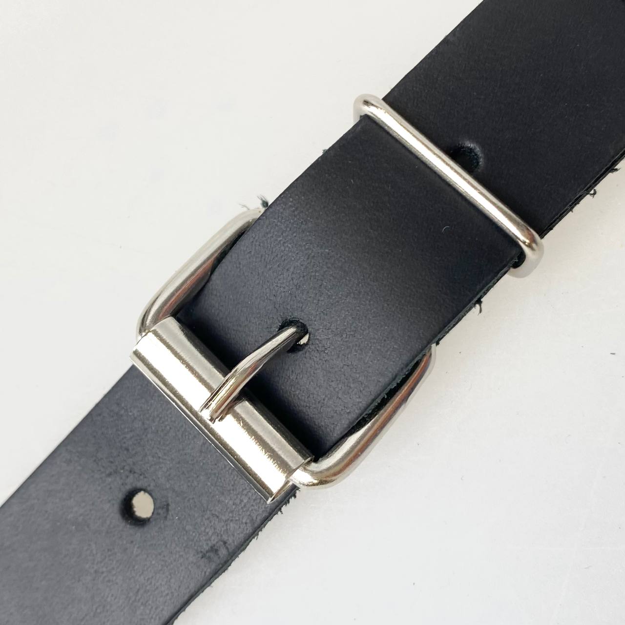 Fastenings: leather straps with steel nickel-plated buckles